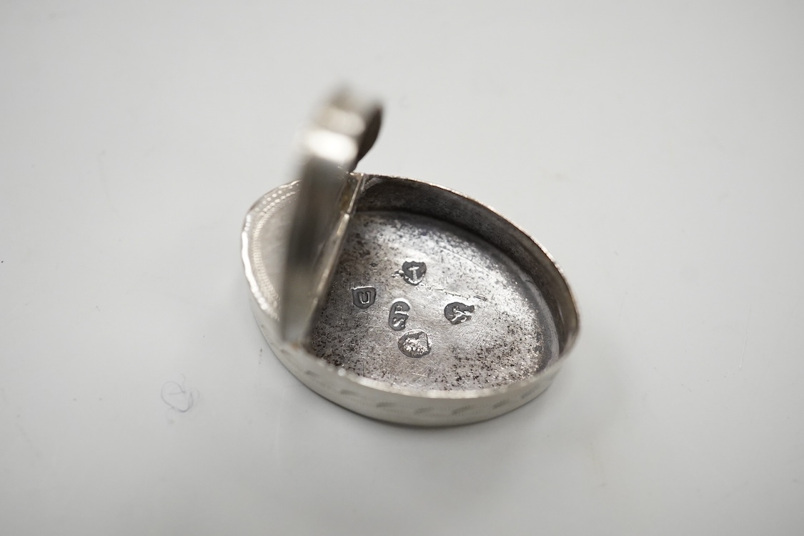 Two George III engraved silver oval patch boxes, largest with hinged cover, Samuel Pemberton, Birmingham, 1818, 28mm, the smaller by John Thornton, Birmingham, 1800.